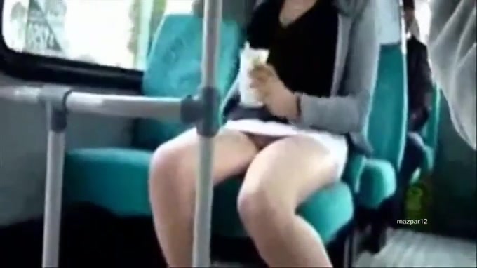 Naughty chick flashes her pretty pussy on the public transport
