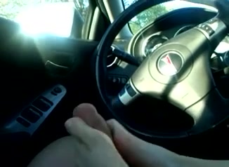 Amateur girl gives an awesome footjob t her BF in the car