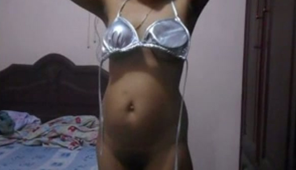 Plump amateur Indian nympho poses in her sexy lingerie in bedroom