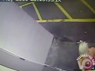 Quick piss in a parking garage caught on security camera