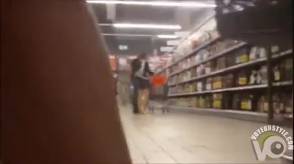 Shaved pussy under her dress at the store
