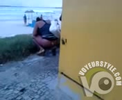 Desperate chick with big booty pees behind a building