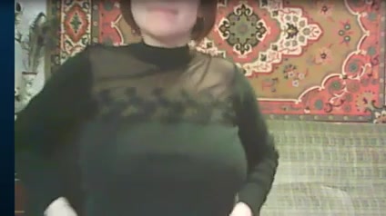 This Russian mature woman is not shy to show off her well developed boobs