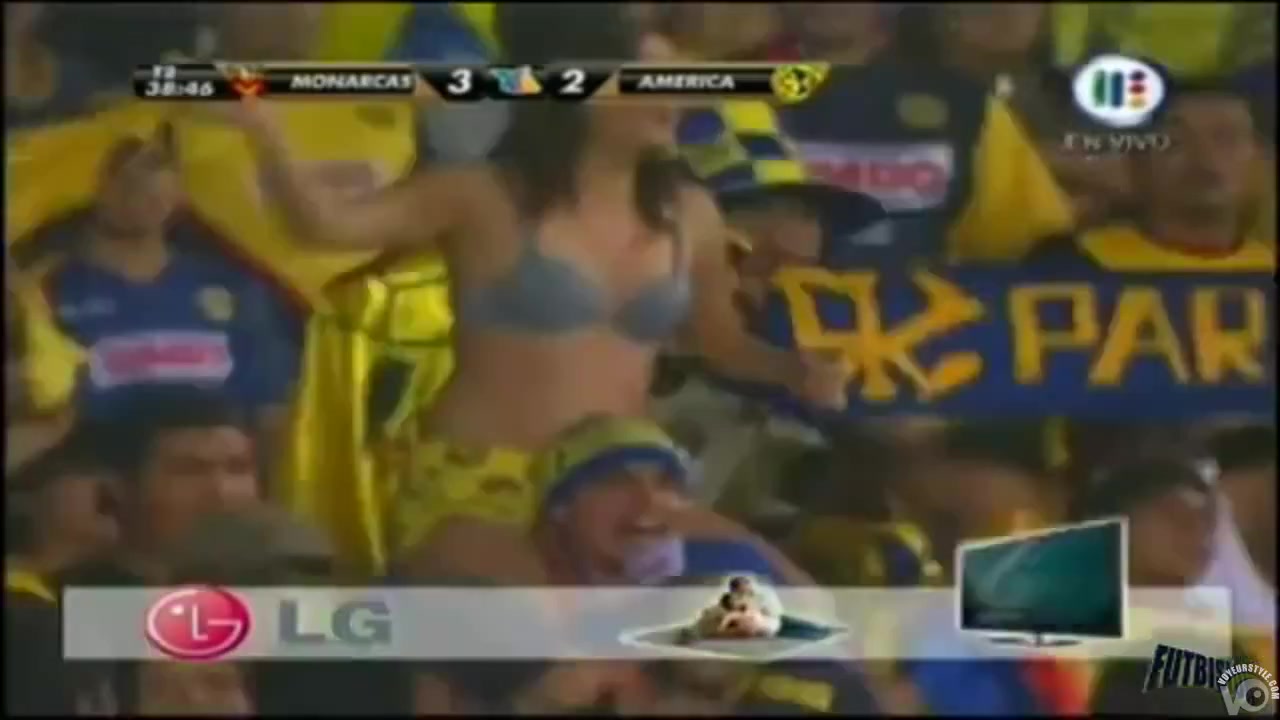 Curvy fangirl shows off her boobs on the football match