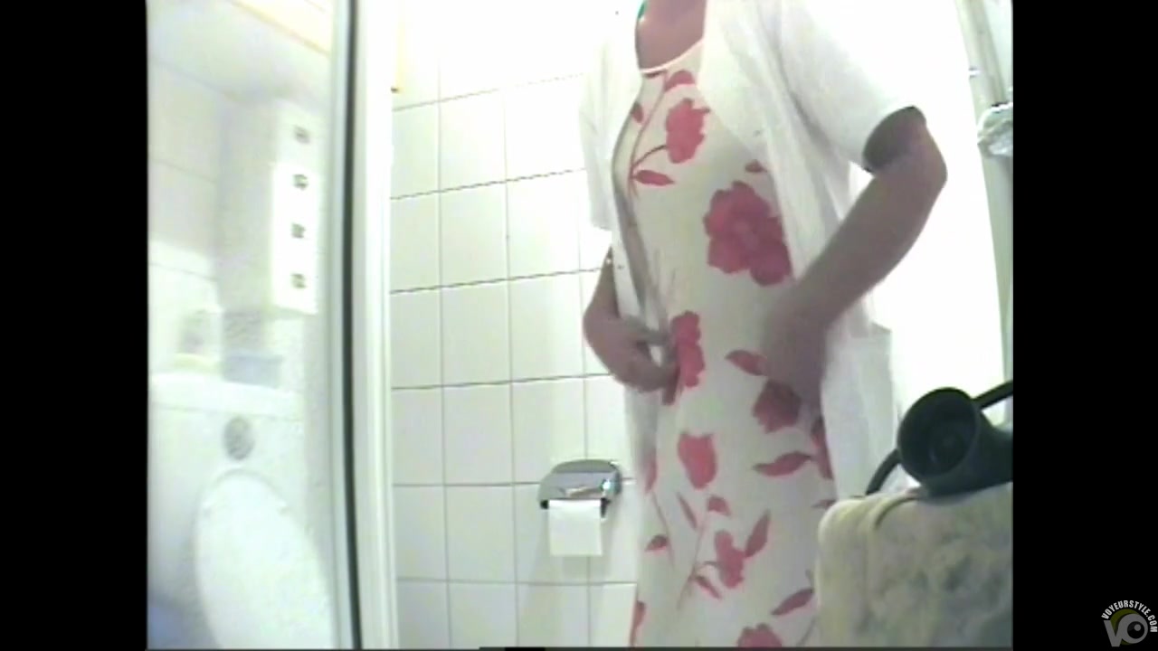 Mature is being filmed when urinating in the bathroom