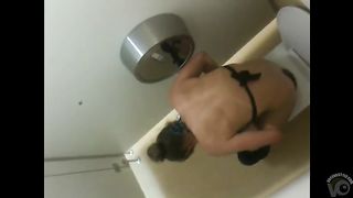 Urinating bikini girl filmed over the restroom wall--_short_preview.mp4