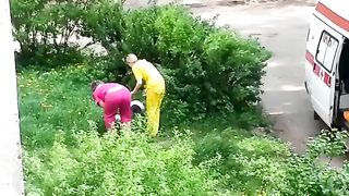 Ambulance picks up lady passed out in the grass--_short_preview.mp4