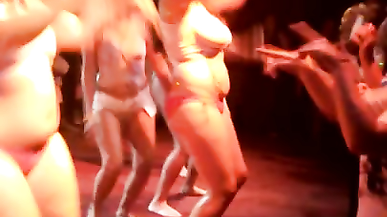 Playful bimbos get crazy and wet while dancing in the club