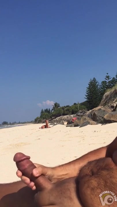 Man jerks off his little cock on a sexy woman at the beach