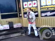 Girl caught peeing outside a store as he laughs