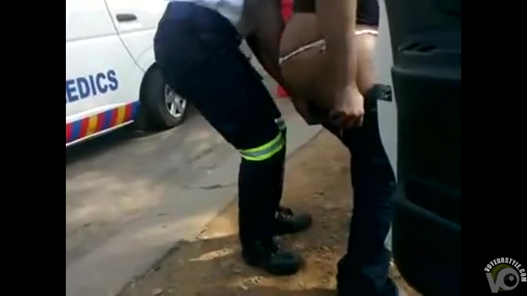 Drunken black woman pisses in the dirt and falls