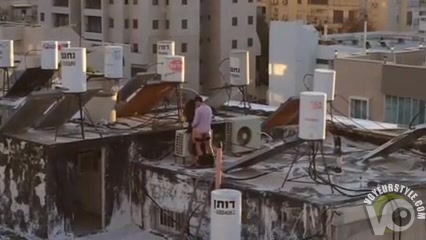 Turkish couple copulates on the top of their building