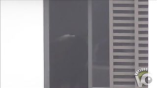 Two voluptuous stunners try out clothes by the window--_short_preview.mp4