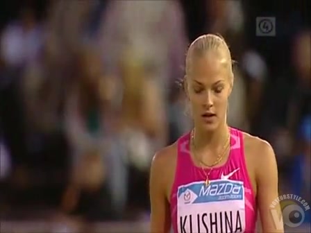 Gorgeous Russian athlete doing her long jumping