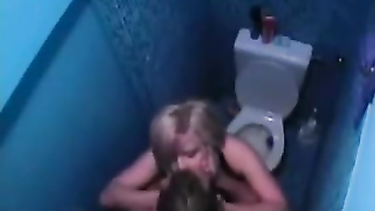 Beautiful blonde babe delivers a blowjob in the restroom