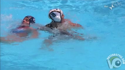 Water polo player has a nipple slip in the pool