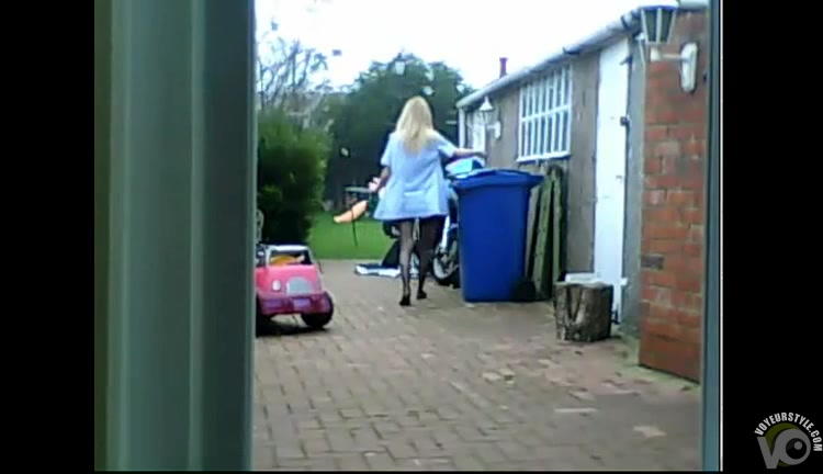 British woman flashes her tits taking out the trash