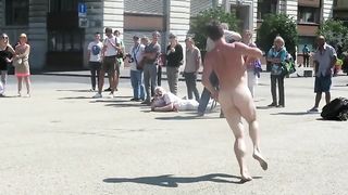 Nude man runs around a public square and gets attention--_short_preview.mp4