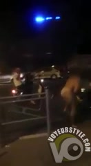 Streaking babe on the street needs attention