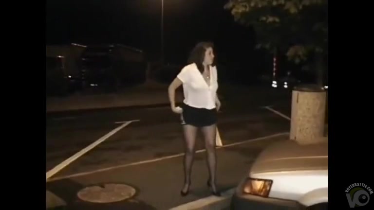 Asian beauty in stockings takes a quick piss in a parking lot