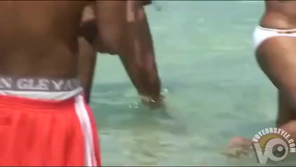 Tit flashing black girls draw attention at the beach