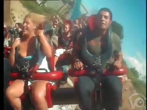 Amateur tits pop out during a roller coaster ride