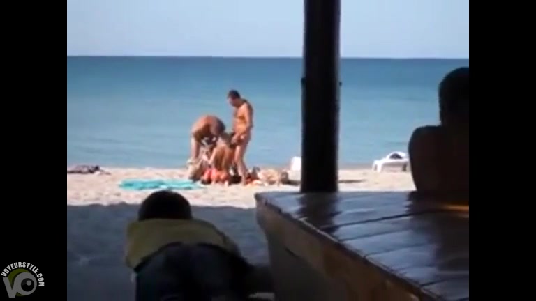 My slutty girlfriend blows two strangers at the public beach