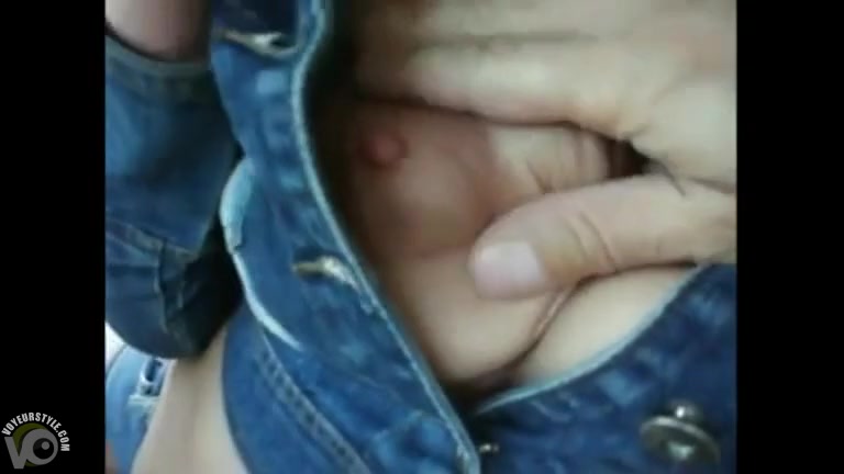 Hitchhiker flashes her sexy tits in the car
