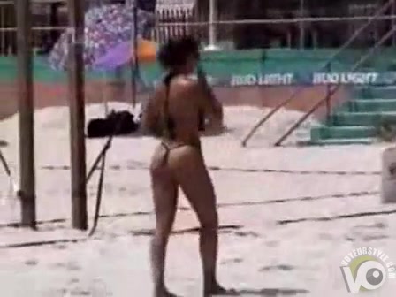 Amazing athletic ass on a beach volleyball player