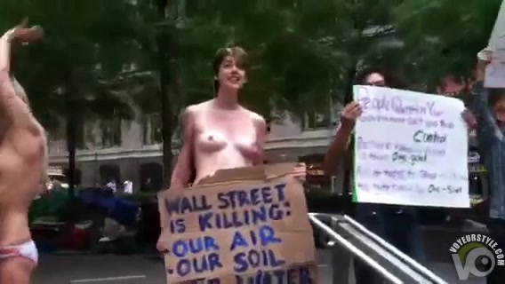 Half-naked chicks protesting against capitalism