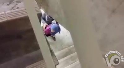 Muslim couple having some fun under the stairs