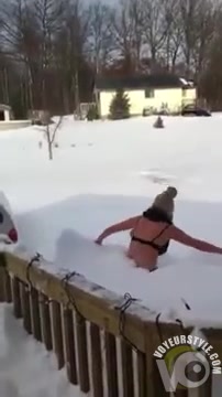 Sexy American girl goes into snow half-naked