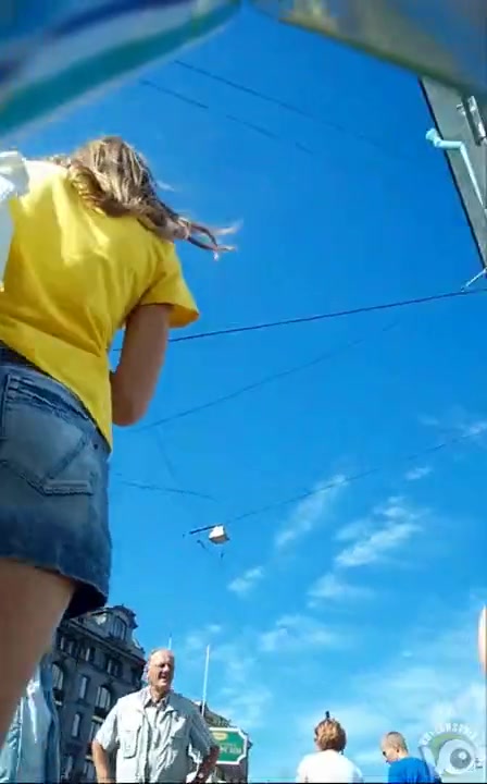 Peeking under to see the thongs