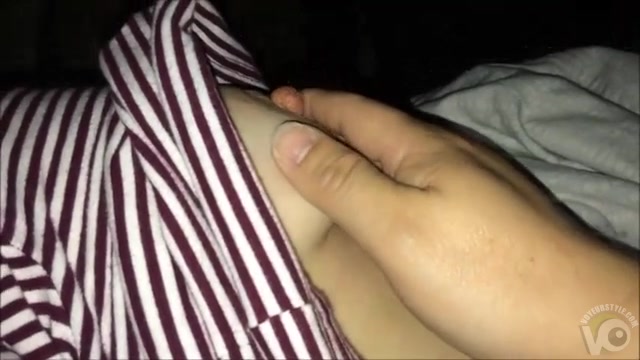Softly fondling the tit of a sleeping roommate