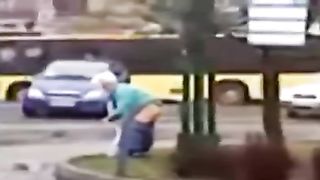Blonde chick peeing on a public street corner--_short_preview.mp4