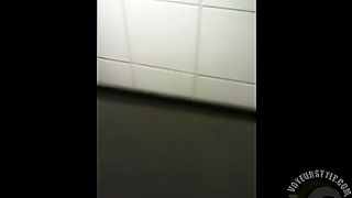 Spying over the bathroom stall on a peeing girl--_short_preview.mp4