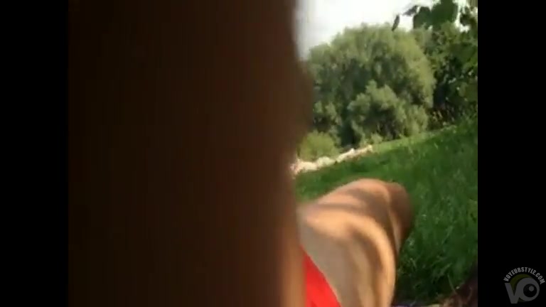 Jacking off to a tanning babe in the grass