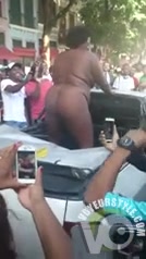 Brazilian BBW removes a yellow dress in the street