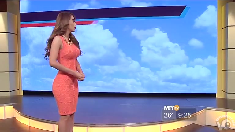 Stunningly hot weather woman in a skintight dress