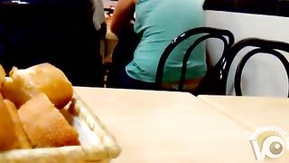 Chubby lady pulls out her tits in the restaurant