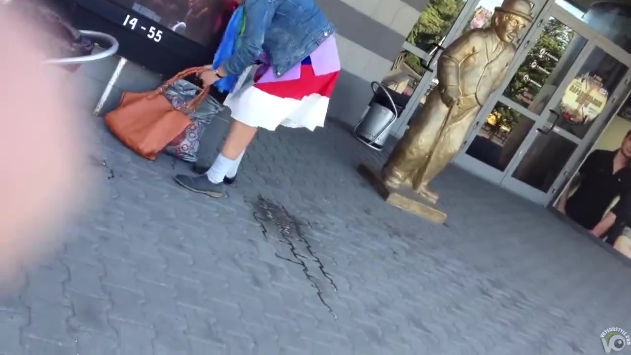 Nasty old woman takes a public leak