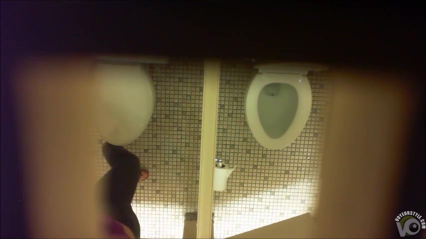 Sensual hotties caught urinating in a restroom