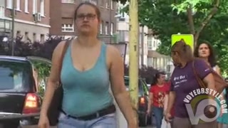 Big bouncy boobs on a British woman walking the street