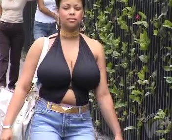 Huge black boobs bounce in a halter top