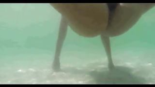 Girl sticks a bottle in her asshole while swimming in the sea--_short_preview.mp4