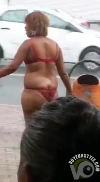 Alluring madam goes completely nuts in the rain!