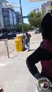Crazy black lady shows her ass to the camera