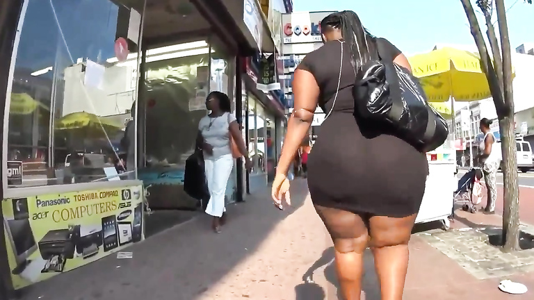 Ebony BBW with a huge booty walks down the street