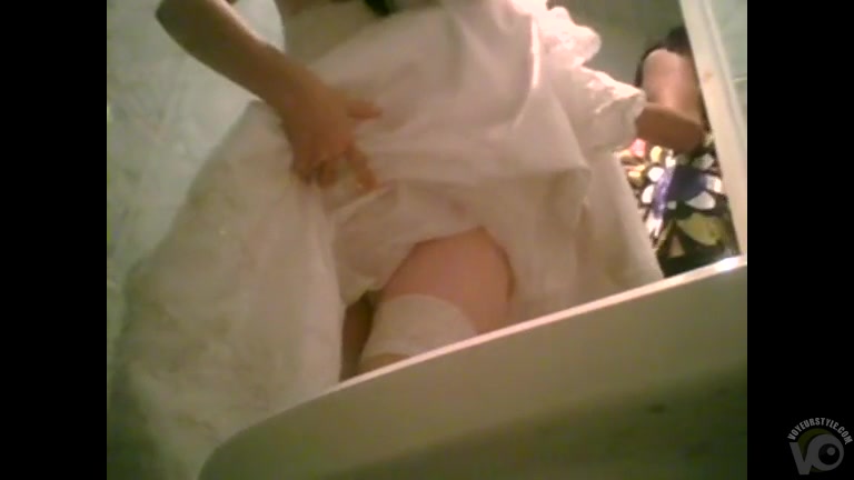 Beautiful bride pees before her wedding