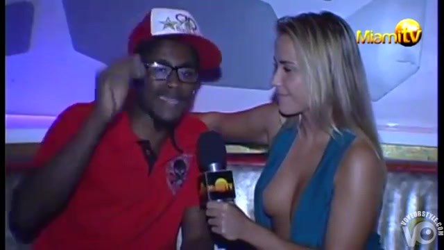 Lovely blonde TV host shows off her juicy boobs in a revealing shirt